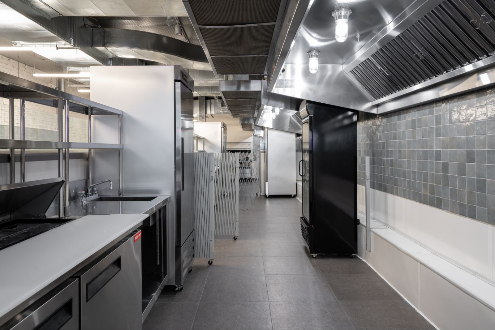 Main kitchen corridor with prep stations
